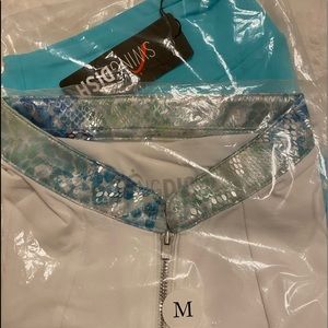 SwingDish Golf sleeveless top and coordinating, pleated back skort!   So cute!!